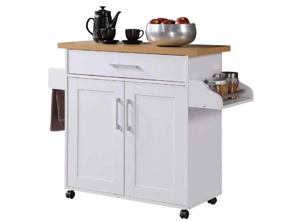 While those fancy kitchen islands are great, this affordable one can move around wherever you need it. (Source: Amazon)