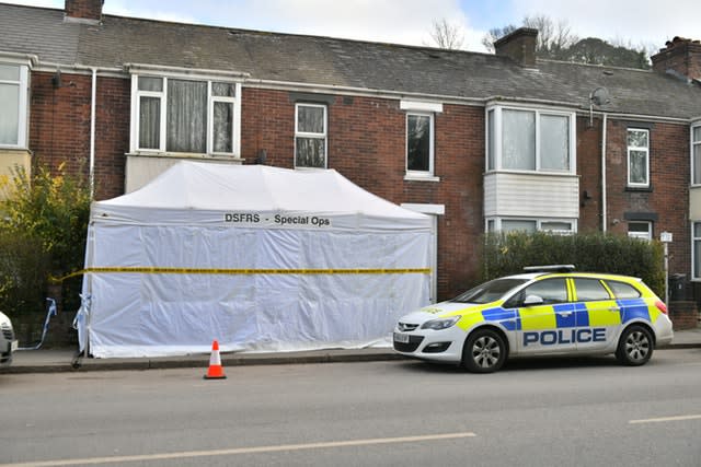 The scene outside 65 Bonhay Road, Exeter, where the body of Anthony Payne, 80, was discovered 