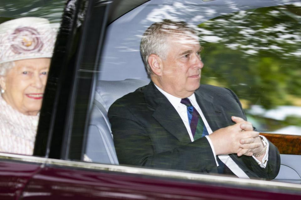 Queen Elizabeth II and her son, Prince Andrew, are driven from Crathie Kirk Church near Balmoral Castle following the service on Aug. 11, 2019 in Aberdeenshire, Scotland.