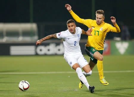 Football - Lithuania v England - UEFA Euro 2016 Qualifying Group E - LFF Stadium, Vilnius, Lithuania - 12/10/15 England's Kyle Walker in action with Lithuania's Arturas Zulpa Action Images via Reuters / Carl Recine Livepic EDITORIAL USE ONLY.