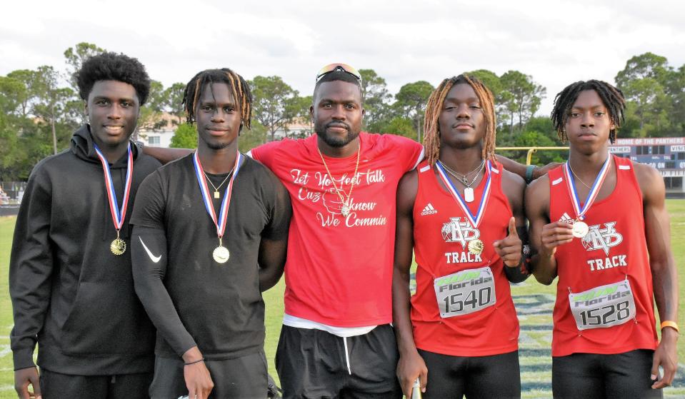 Vero Beach's 4x100 relay team of Michael Carter, Tromance Smith, EJ White and Derrick Williams ran a time of 41.38 seconds to take the top spot at the Region 3-4A Championship at Dwyer High School on Friday. Vero Beach's boys won the team championship.