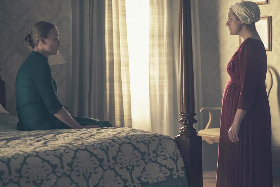 THE HANDMAID'S TALE, from left: Yvonne Strahovski, Elisabeth Moss, 'The Word', (Season 2, ep. 213, aired July 11, 2018)