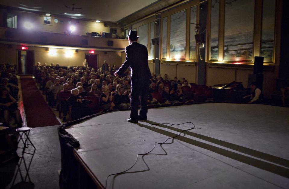 Master of ceremonies Kevin Cook warms up the audience with jokes during a vaudeville show. The Patricia was the first cinema built in Powell River and although others opened up there, none have survived. (Reuters)