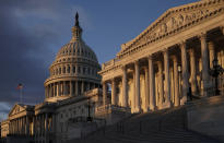 The Capitol is seen in Washington, early Friday, Nov. 8, 2019, as House Democrats continue to probe whether President Donald Trump violated his oath of office by coercing Ukraine to investigate political rival Joe Biden and his family. Rep. Adam Schiff, chairman of the House Intelligence Committee, is releasing key transcripts from hours of closed-door interviews in the impeachment inquiry as they prepare for public sessions with witnesses next week. (AP Photo/J. Scott Applewhite)