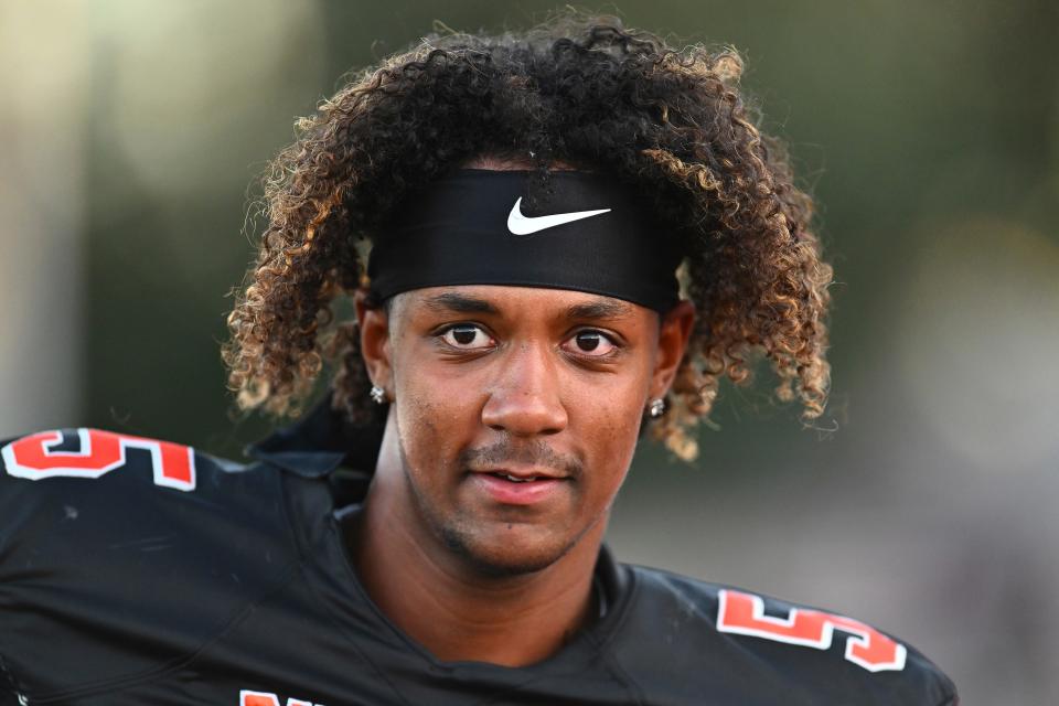 Pittsburg quarterback Jaden Rashada warms up before the start of their game against McClymonds at Pittsburg High School in Pittsburg, Calif., Sept. 30, 2022. Using name, image and likeness (NIL) compensation to recruit college athletes is still very much against NCAA rules. The recent de-commitment from Florida by blue chip quarterback Rashada shows that NIL is definitely a factor in decisions.