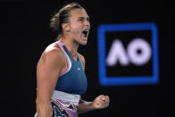 Aryna Sabalenka of Belarus reacts after winning a point against Magda Linette of Poland during their semifinal match at the Australian Open tennis championship in Melbourne, Australia, Thursday, Jan. 26, 2023. (AP Photo/Aaron Favila)