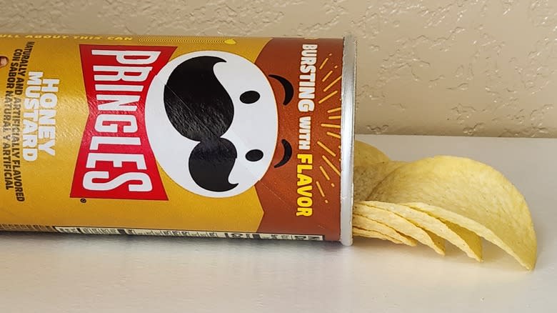 Honey Mustard Pringles spilling out of can