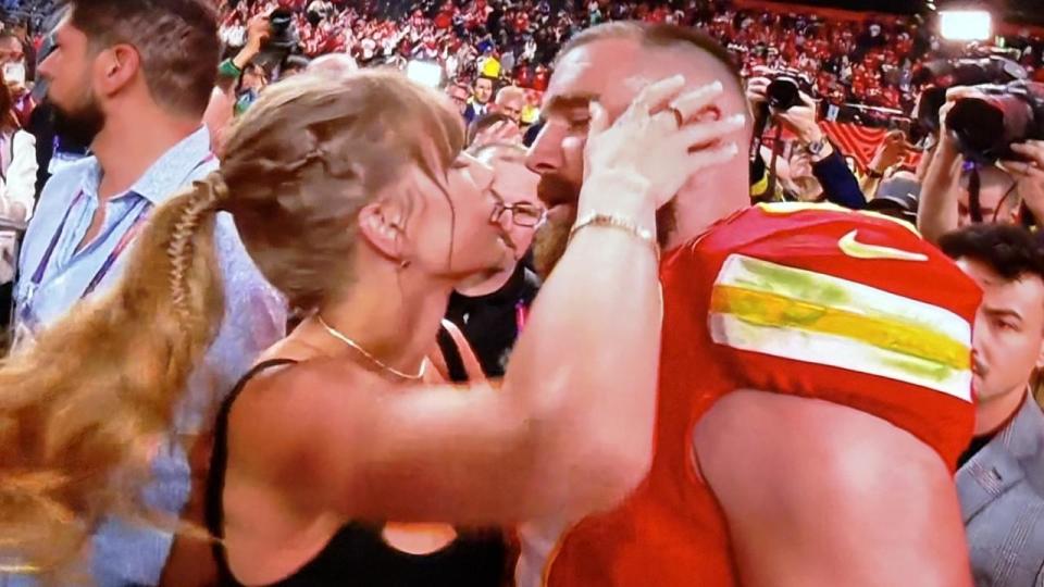 Taylor Swift with her boyfriend Travis Kelce at the 2024 Super Bowl.