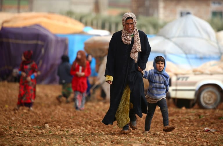 Displaced Syrians, who fled their hometowns due to clashes between regime forces and the Islamic State (IS) group, pictured in Kharufiyah, 18 kilometres south of Manbij, northern Syria on March 4, 2017