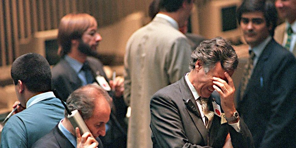 raders of the Argentine stock exchange wait for the closing bell, 27 October, in Buenos Aires