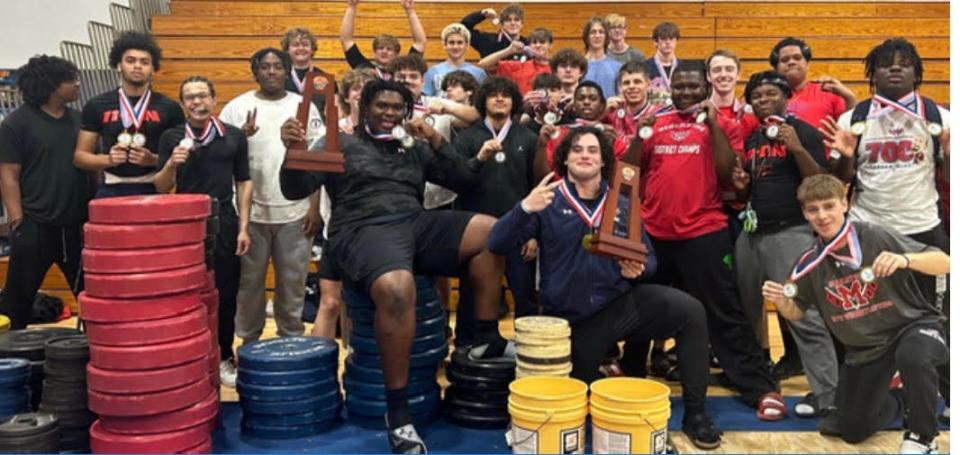 Members of the Manatee High School boys weightlifting team which won the Class 3A-District 11 titles in Olympic and Traditional lifting on Saturday at Manatee High. The Hurricanes had nine district champions.