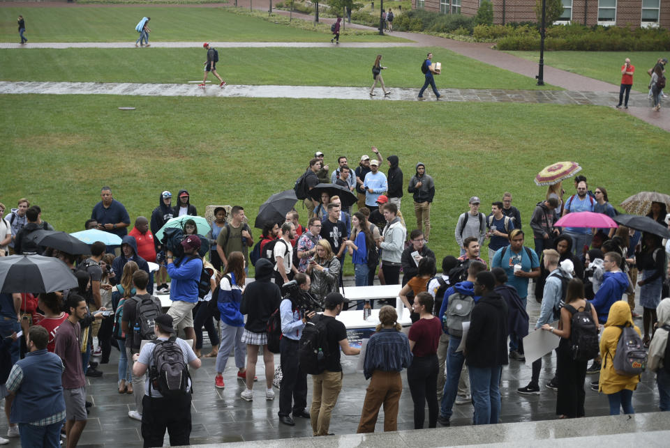 Students gather near a student protest Liberty University in Lynchburg, September 13, 2019. (Taylor Irby/The News & Advance via AP)
