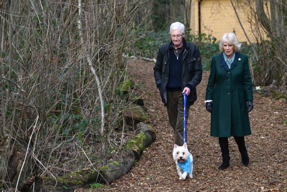 The Duchess of Cornwall goes on a walk with Battersea Ambassador Paul O’Grady and a rescue dog (Stuart Wilson/PA) (PA Wire)