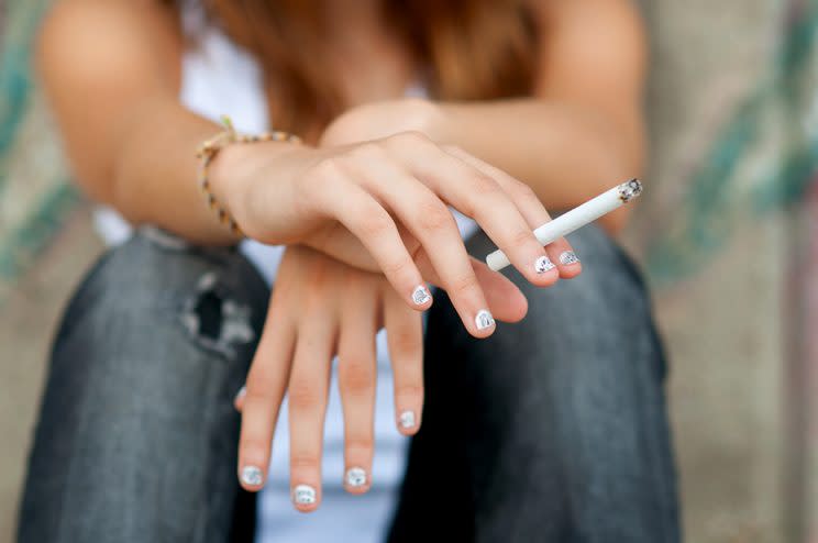 Teens with negative body image are more likely to use cigarettes and alcohol. (Photo: Getty Images)