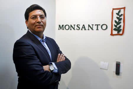Dhiraj Pant, technology head of Monsanto Asia, poses inside his office in Gurugram on the outskirts of New Delhi. REUTERS/Adnan Abidi