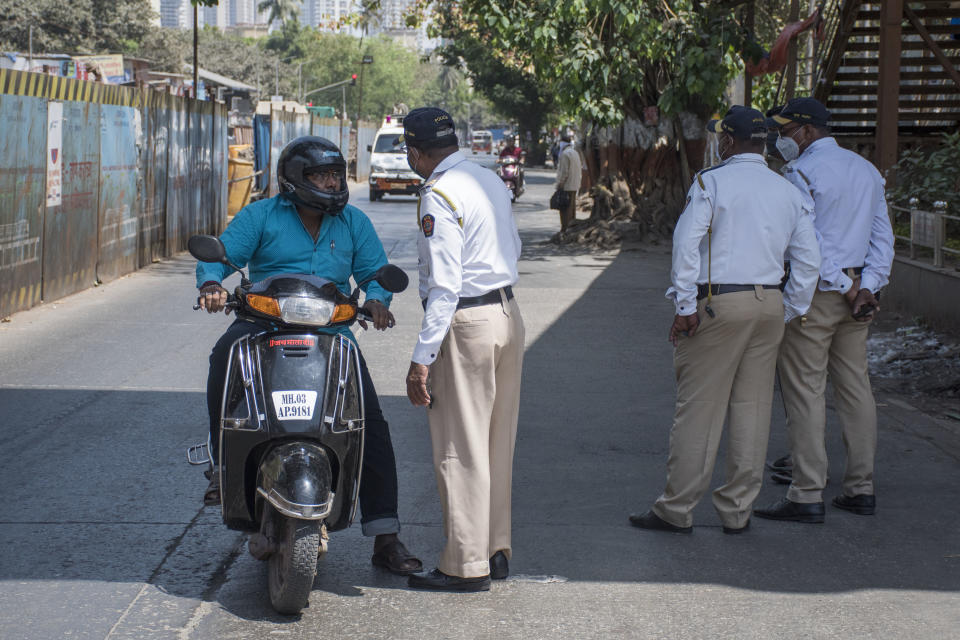 MUMBAI, INDIA - MARCH 23: Traffic police checking due to Covid 19 pandemic at Bhandup, on March 23, 2020 in Mumbai, India. (Photo by Pratik Chorge/Hindustan Times via Getty Images)