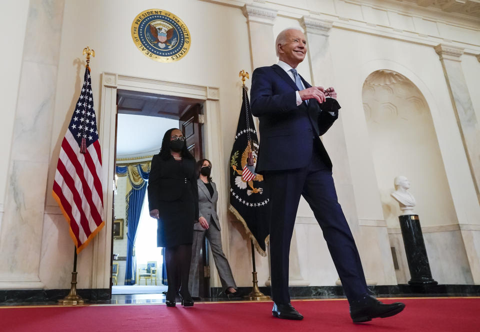 FILE - President Joe Biden, right, arrives with Vice President Kamala Harrisand Judge Ketanji Brown Jackson, left, to announce Judge Ketanji Brown Jackson as his nominee to be an Associate Justice of the U.S. Supreme Court at the White House in Washington, Feb. 25, 2022. (AP Photo/Carolyn Kaster, File)