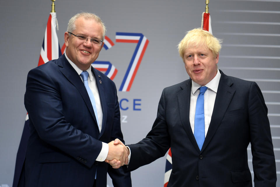 Scott Morrison shakes hands with new British prime minister Boris Johnson. Source: AAP