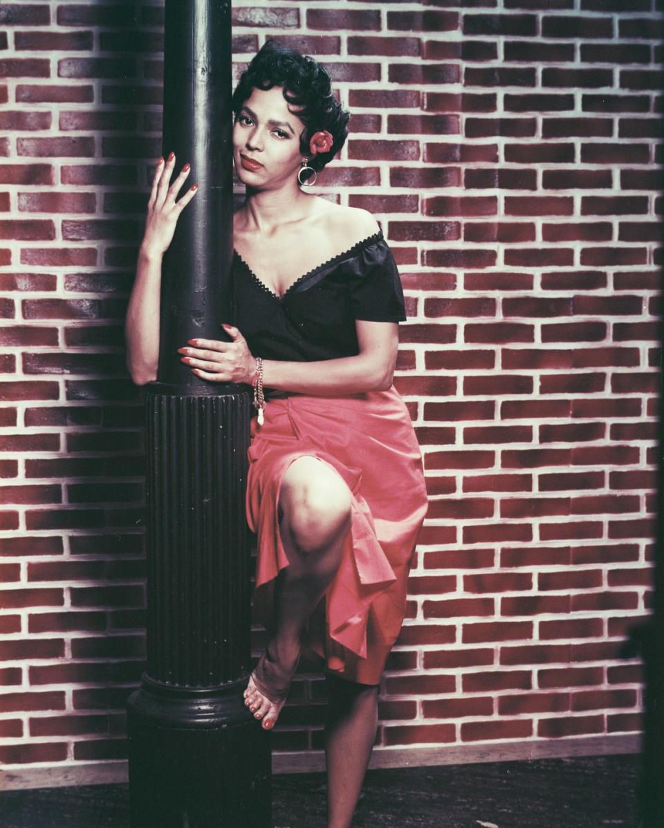 <p>For her role as the titular star in <em>Carmen Jones,</em> Dorothy Dandridge became the <a href="https://www.encyclopedia.com/people/literature-and-arts/film-and-television-biographies/dorothy-dandridge" rel="nofollow noopener" target="_blank" data-ylk="slk:first African-American actress;elm:context_link;itc:0;sec:content-canvas" class="link ">first African-American actress</a> to earn an Academy Award nomination for Best Actress. More than 60 years later, we're still buzzing about the chic black-and-red ensemble she wore in the film.</p>