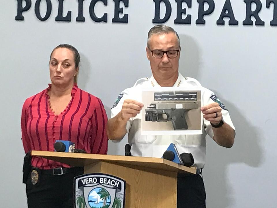 Vero Beach police Chief David Currey shows the 9 mm that discharged killing the 14-year-old who made it with online parts as two teens tussled to hold the weapon, he said in a press conference on March 15, 2022.