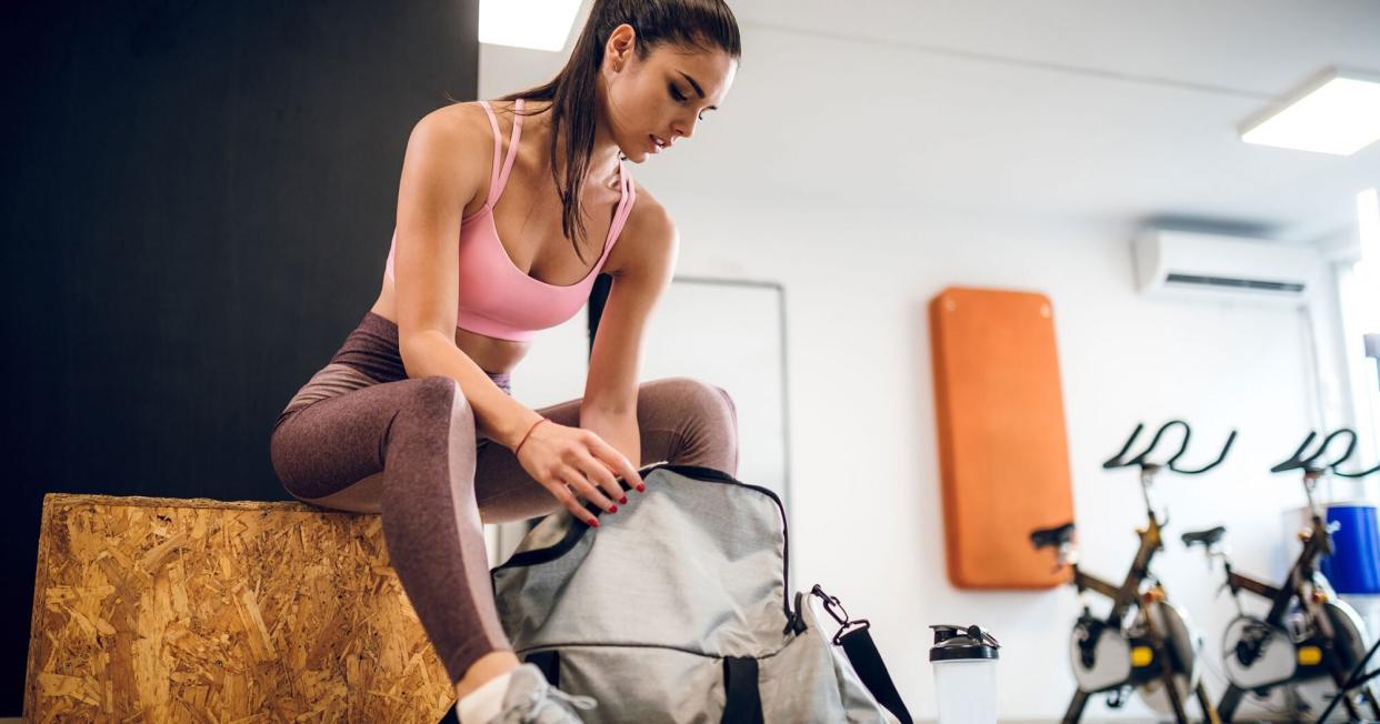 Woman with gym bag