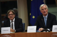 European Union chief Brexit negotiator Michel Barnier, right, sits next to European Parliament Brexit chief Guy Verhofstadt during a Brexit Steering Group meeting at the European Parliament in Brussels, Wednesday, Oct. 16, 2019. (AP Photo/Francisco Seco)