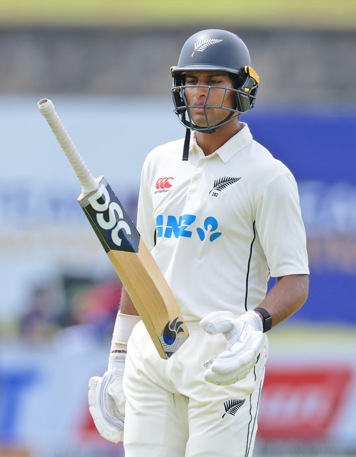 New Zealand's Rachin Ravindra reacts as he leaves the field after losing his wicket to Sri Lanka's Prabath Jayasuriya on the fifth and final day of the first cricket test match between New Zealand and Sri Lanka in Galle, Sri Lanka, Monday, Sept. 23, 2024. (AP Photo/Viraj Kothalawala)