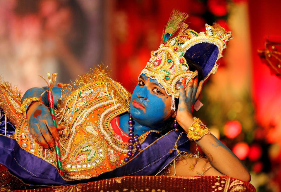 <p>A girl dressed up as Hindu Lord Krishna performs during Janmashtami festival celebrations marking the birth of Lord Krishna, in Ahmedabad, India, Aug. 25, 2016. (Photo: Amit Dave/Reuters) </p>