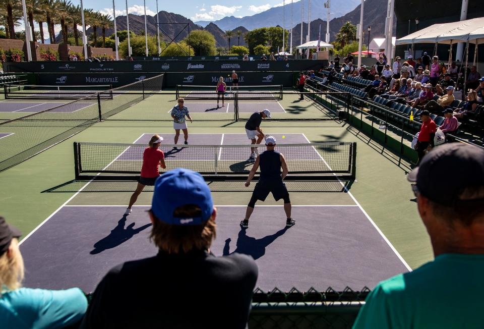 Courts are seen divided for multiple games during the USA Pickleball National Championships in Indian Wells, Calif., Wednesday, Nov. 9, 2022. 