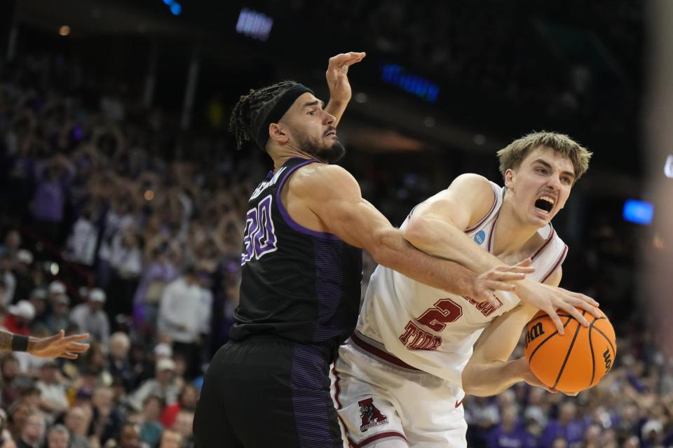 Alabama Crimson Tide forward Grant Nelson (2) plays the ball defined by Grand Canyon Antelopes forward Gabe McGlothan (30) in the second half at Spokane Veterans Memorial Arena.