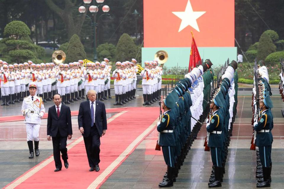 Donald Trump and Vietnamese president Tran Dai Quang at the presidential palace in Hanoi on 12 November.