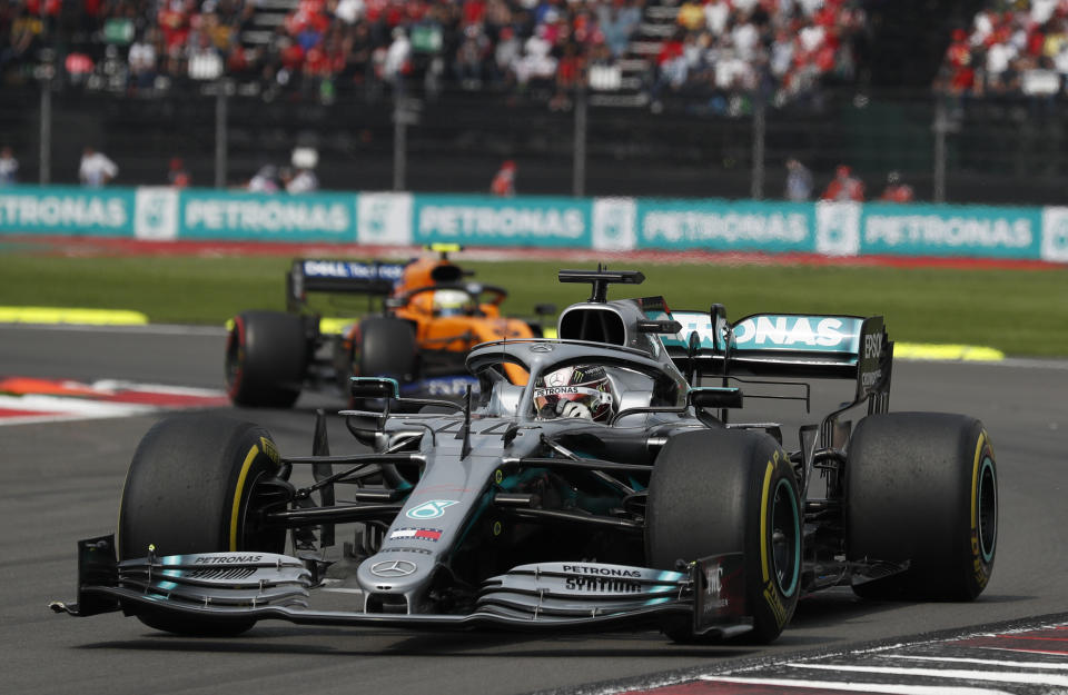 Mercedes driver Lewis Hamilton, of Britain, drives out of a curve during the Formula One Mexico Grand Prix auto race at the Hermanos Rodriguez racetrack in Mexico City, Sunday, Oct. 27, 2019. (AP Photo/Rebecca Blackwell)