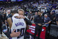 Golden State Warriors coach Steve Kerr, right, hugs Sacramento Kings forward Harrison Barnes (40) after an NBA basketball play-in tournament game Tuesday, April 16, 2024, in Sacramento, Calif. The Kings won 118-94. (AP Photo/Godofredo A. Vásquez)