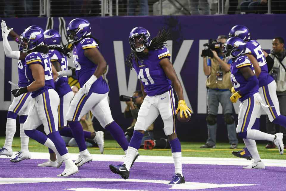 Minnesota Vikings defensive back Anthony Harris (41) celebrates after intercepting a Green Bay Packers pass during the first half of an NFL football game Monday, Dec. 23, 2019, in Minneapolis. (AP Photo/Craig Lassig)