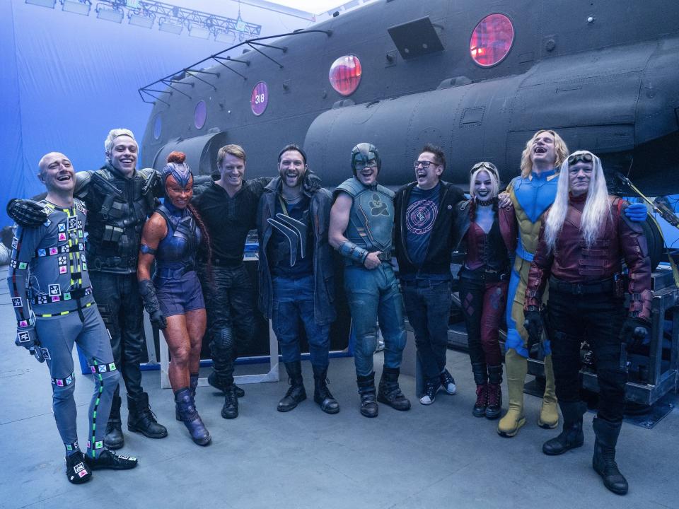 Some of the very large cast of "The Suicide Squad" on set with director James Gunn.