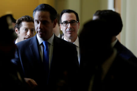 U.S. Treasury Secretary Steve Mnuchin (C) leaves after it was reported House Majority Leader Steny Hoyer (D-MD) would ask the Treasury Department to delay the lifting of sanctions on two companies tied to Russian oligarch Oleg Deripaska to give Congress time to review the decision in Washington, U.S., January 15, 2019. REUTERS/Yuri Gripas