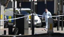 <p>A forensic officer leaves the scene where a van struck pedestrians in Finsbury Park, north London, Monday, June 19, 2017. (Photo: Alastair Grant/AP) </p>