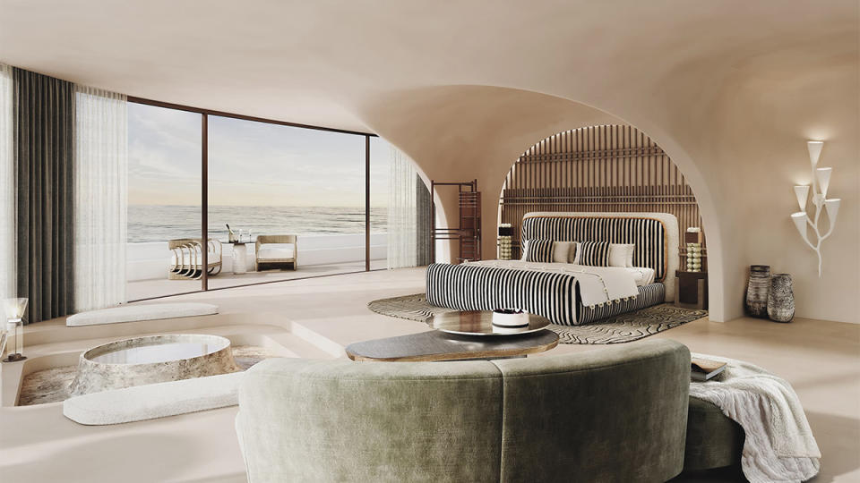 The airy primary bedroom on Oceanco’s 430-foot Aeolus concept features a wall of windows and plenty of sculpted curves.