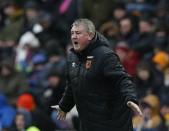 Hull City manager Steve Bruce reacts during their English Premier League soccer match against Newcastle United at the KC Stadium in Hull, northern England January 31, 2015. REUTERS/Andrew Yates