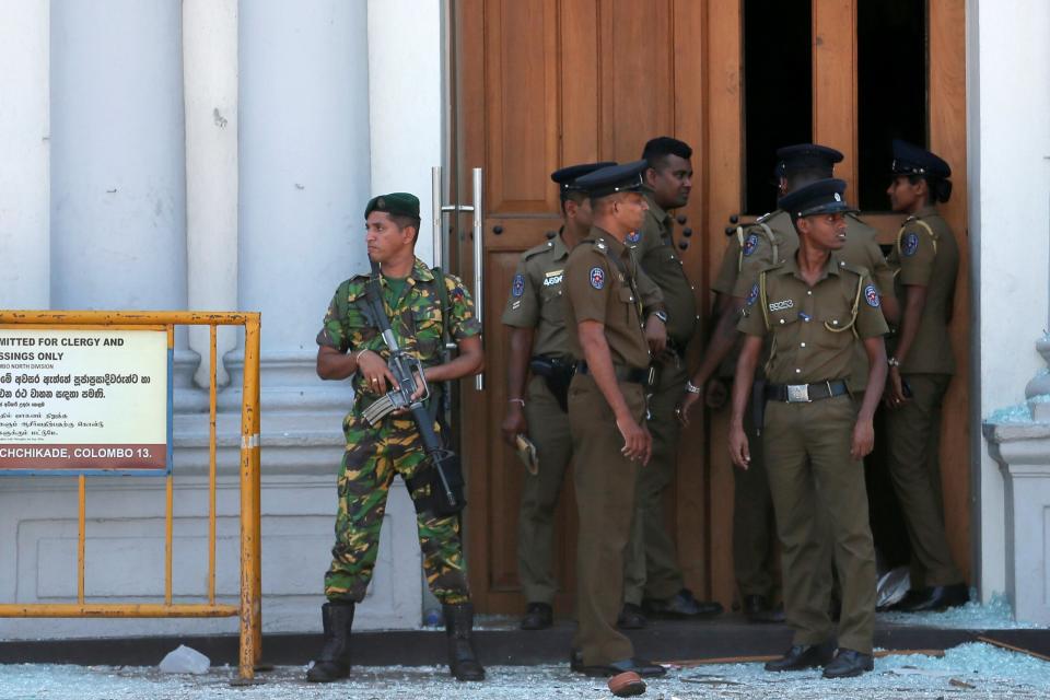 Sri Lankan military stand guard in front of the St. Anthony's Shrine church (REUTERS)