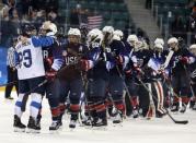 Ice Hockey - Pyeongchang 2018 Winter Olympics - Women's Semifinal Match - U.S. v Finland - Gangneung Hockey Centre, Gangneung, South Korea - February 19, 2018 - Michelle Karvinen of Finland (L) and Jocelyne Lamoureux of U.S. embrace after the game. REUTERS/David W. Cerny