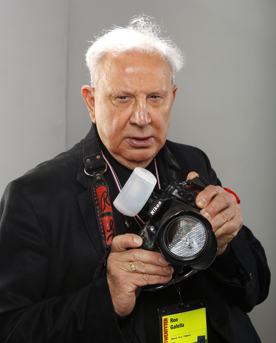 FILE - Ron Galella, the subject of the documentary "Smash His Camera," poses for a portrait at the Gibson Guitar Lounge during the Sundance Film Festival in Park City, Utah, on Jan. 25, 2010. Celebrity photographer Galella has died at age 91. A spokesperson says Galella died Saturday, April 30, 2022, at his home in Montville, N.J., of congestive heart failure. (AP Photo/Carlo Allegri, File)