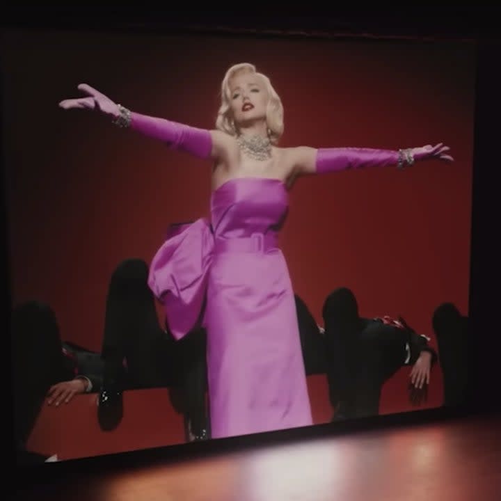 Ana as Marilyn outstretching her arms in a movie