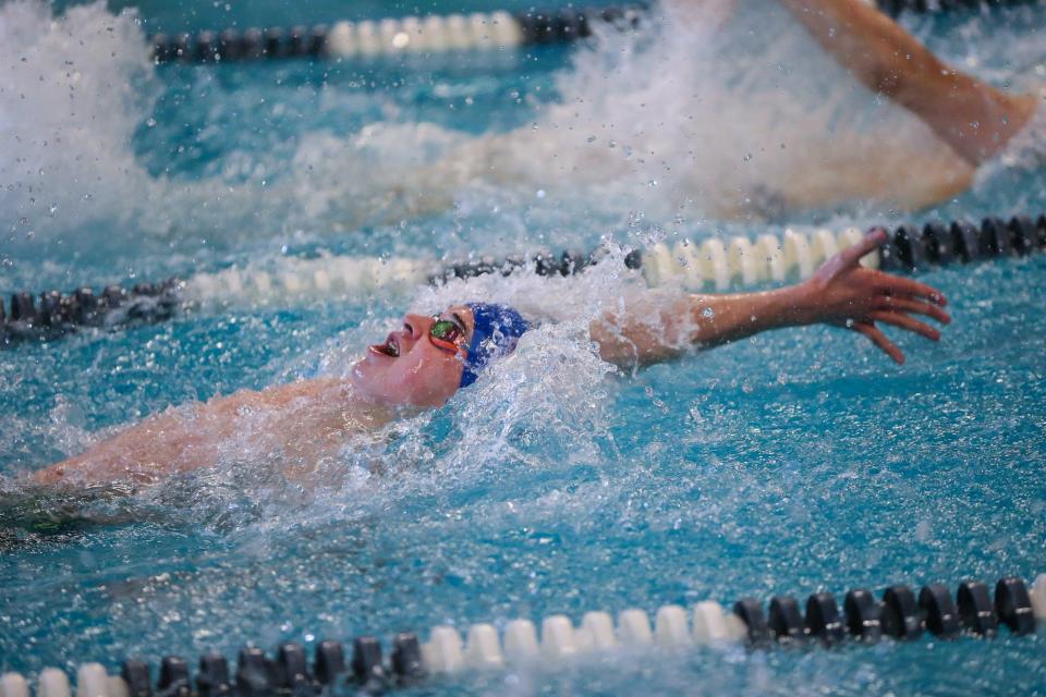 Natick’s Dominic Crisafulli competes in the 200-yard Medley Relay during the swim meet against Framingham at Keefe Tech in Framingham on Jan. 21, 2022.