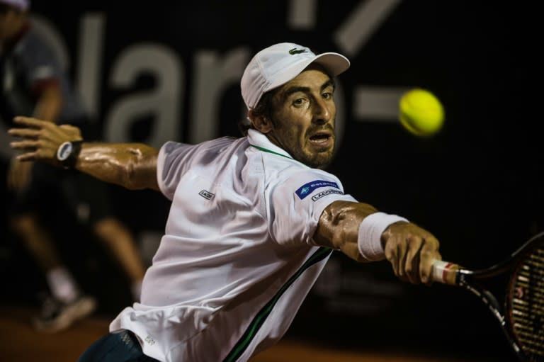 Pablo Cuevas of Uruguay plays against Guido Pella of Argentina during their ATP Rio Open men's singles final match, on February 21, 2016