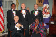 FILE - The Kennedy Center Honors recipients of 1993, are, founder of the Dance Theater of Harlem Arthur Mitchell, from left, entertainer Johnny Carson, composer-lyricist Stephen Sondheim; sitting from left, conductor Georg Solti and singer Marion Williams posing for a portrait wearing their medals following a dinner in their honor at the State Department in Washington, D.C., on Dec. 4, 1993. Sondheim, the songwriter who reshaped the American musical theater in the second half of the 20th century, has died at age 91. Sondheim's death was announced by his Texas-based attorney, Rick Pappas, who told The New York Times the composer died Friday, Nov. 26, 2021, at his home in Roxbury, Conn. (AP Photo/Wilfredo Lee, File)