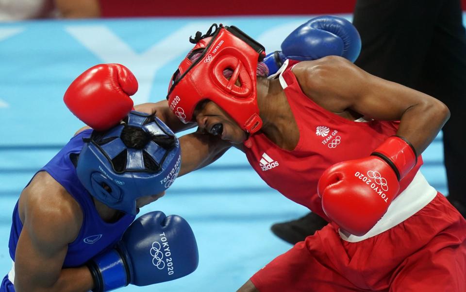 Caroline Dubois of Great Britain (right) and Sudaporn Seesondee of Thailand during the Women's Light (57-60kg) Quarter final 2 at the Kokugikan Arena on the eleventh day of the Tokyo 2020 Olympic Games in Japan - PA