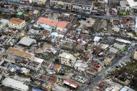 <p>Storm damage in the aftermath of Hurricane Irma, in St. Maarten. Irma cut a path of devastation across the northern Caribbean, leaving thousands homeless after destroying buildings and uprooting trees, on Sept. 6, 2017. (Photo: Gerben Van Es/Dutch Defense Ministry via AP) </p>