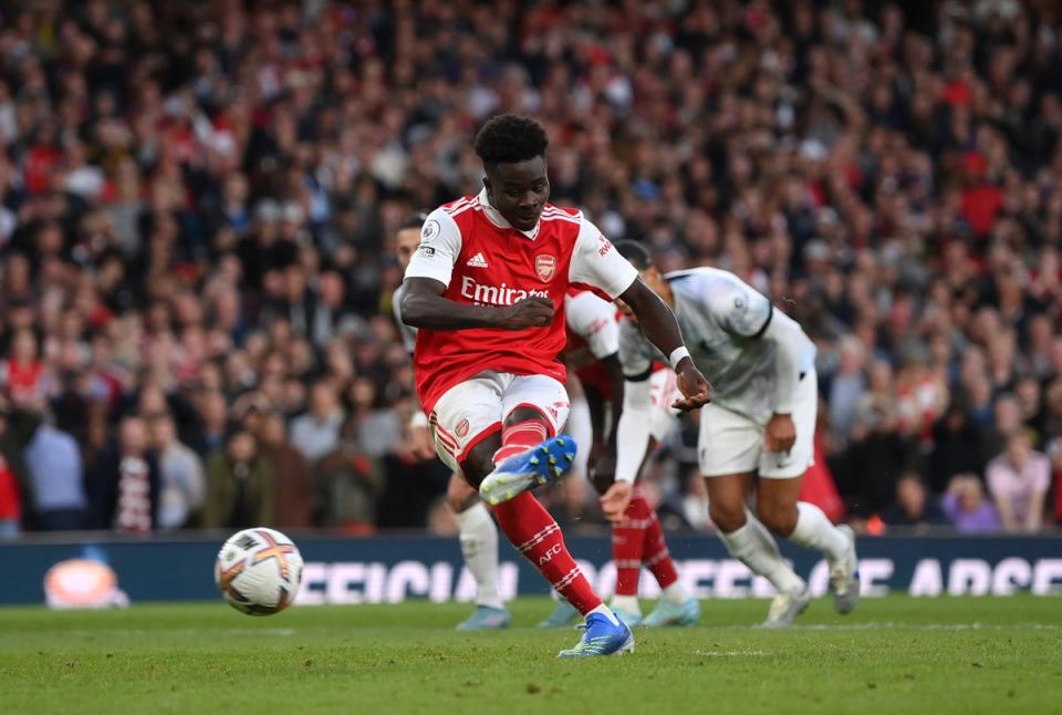 Bukayo Saka of Arsenal scores from the penalty spot (Getty Images)