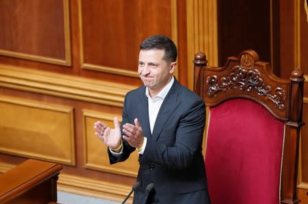 Ukrainian President Volodymyr Zelenskiy attends the first session of newly-elected parliament in Kiev